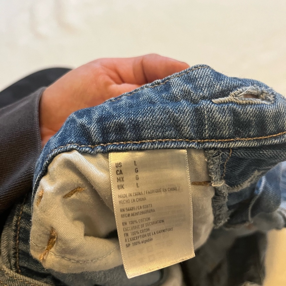 Large distressed American eagle overalls